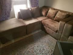 brand new L shape 7 seater sofa with table.