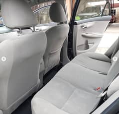 Toyota corolla front and back seats with orignal company fabric cover