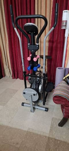 Elliptical bike with twister and dumbells