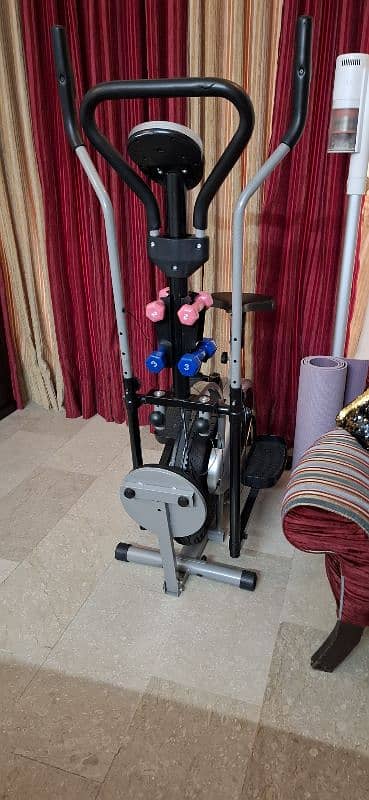 Elliptical bike with twister and dumbells 0