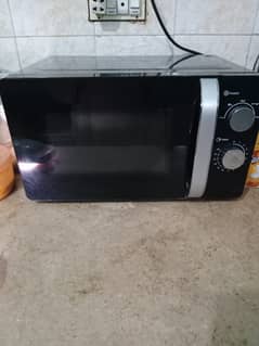 Only one month used microwave oven for sale