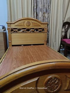 single wooden bed