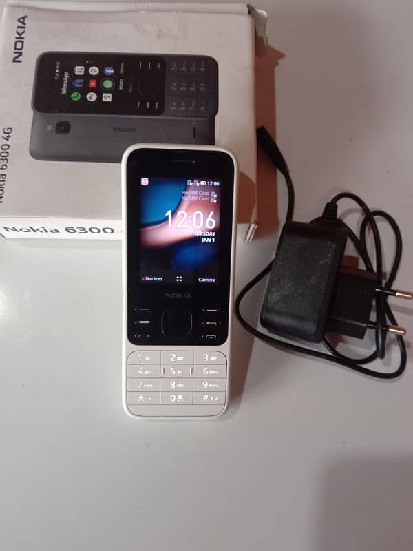 Nokia 6300 4G  good condition with charger and box 0