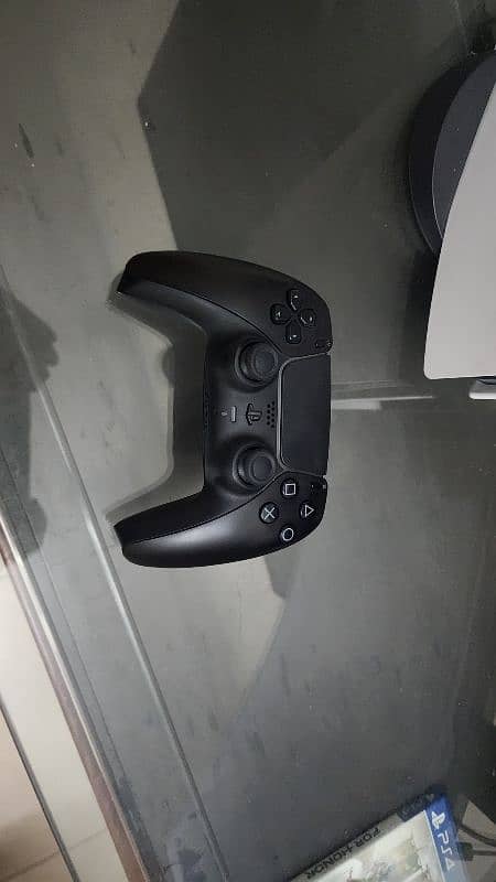 PlayStation 5 with controller 2