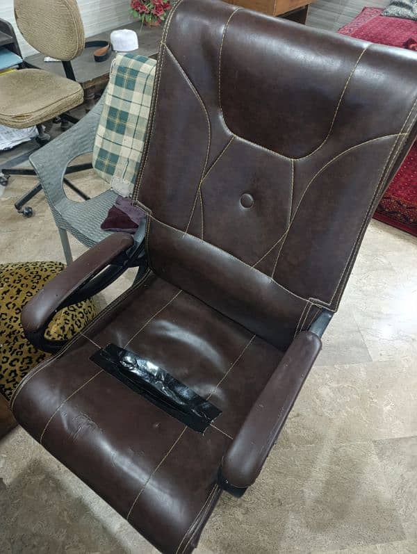 elegant brown revolver chair 0