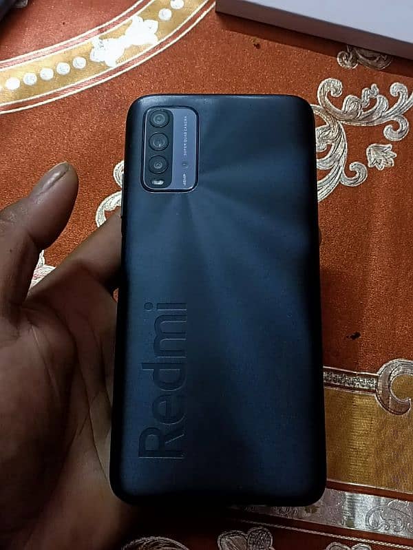 Redmi 9T in great condition with box and charger 7