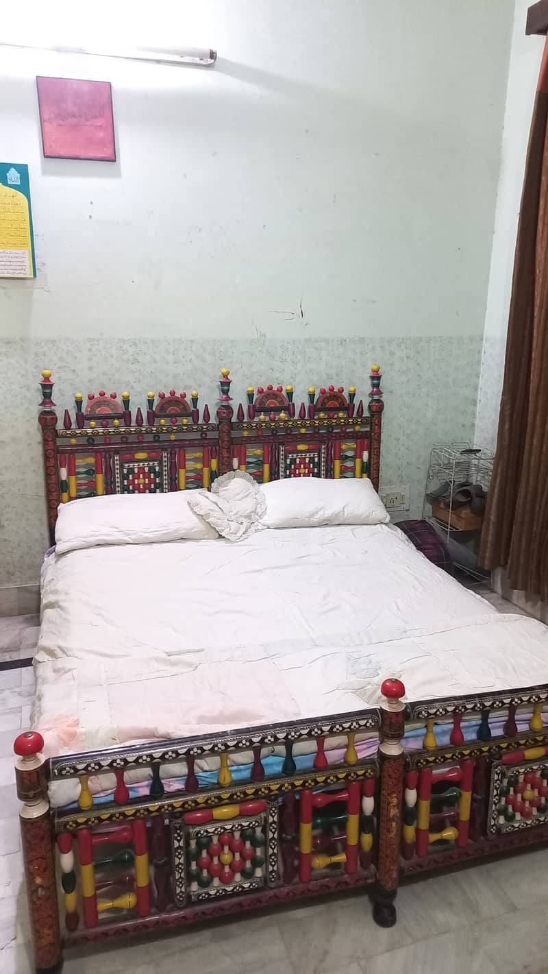 Ethnic multicolor wooden bed and sofa with intricate design 0