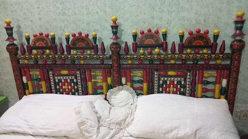 Ethnic multicolor wooden bed and sofa with intricate design 2