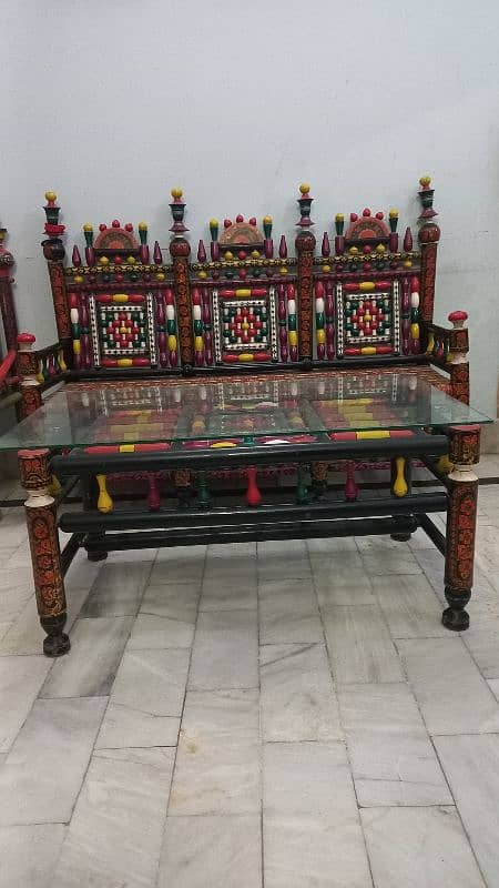 Ethnic multicolor wooden bed and sofa with intricate design 3