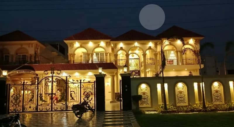 2 kanal house for sale 6 beds 200 feet road Valencia town Lahore Pakistan 0