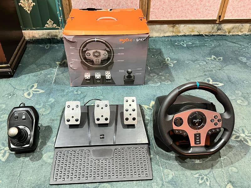 pxn v9 steering wheel for gaming . it's use in pc, laptop, PS4,ps5 5