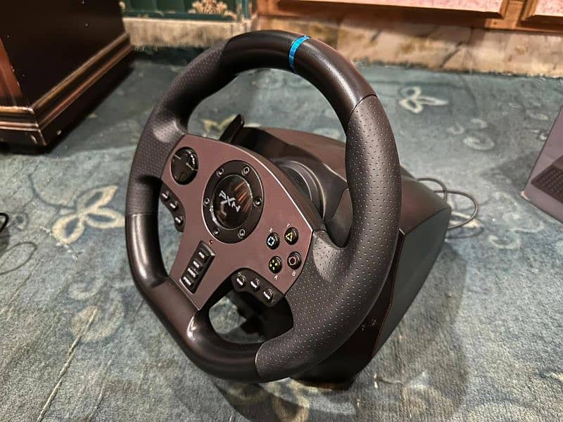 pxn v9 steering wheel for gaming . it's use in pc, laptop, PS4,ps5 6