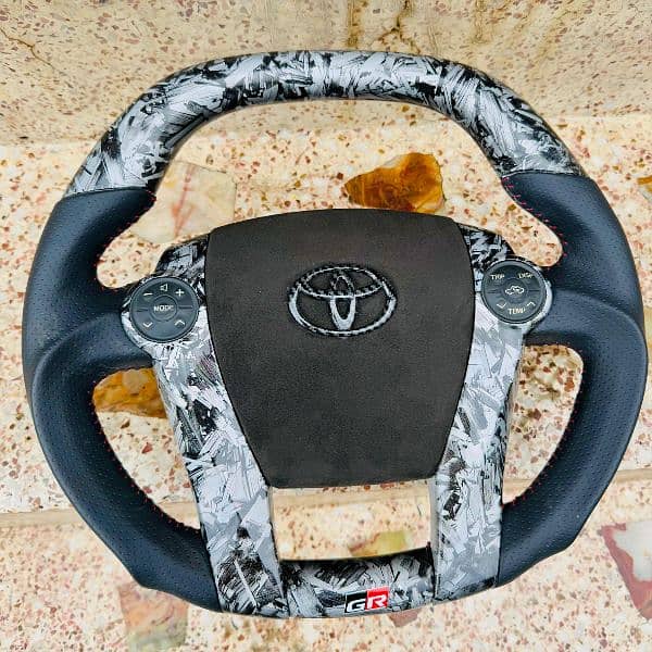 Toyota Prius + Aqua carbon fiber steering available 4