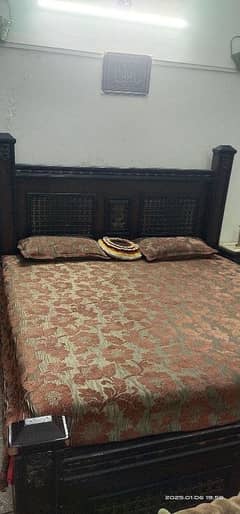 double bed with 2 side tables dressing table and theeepiece almarah