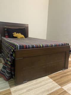 2 single beds with side tables and 2 matresses