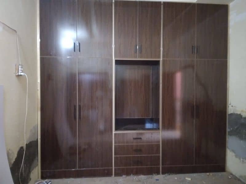 office and home wooden work,media wall,wood work,cabinets,Carpentery 2