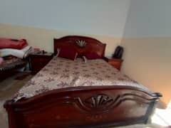 Wooden Bed with side tables and mattress available for sale