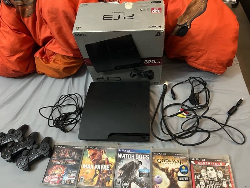 Ps3 with box and 5 games price slightly negotiable 0