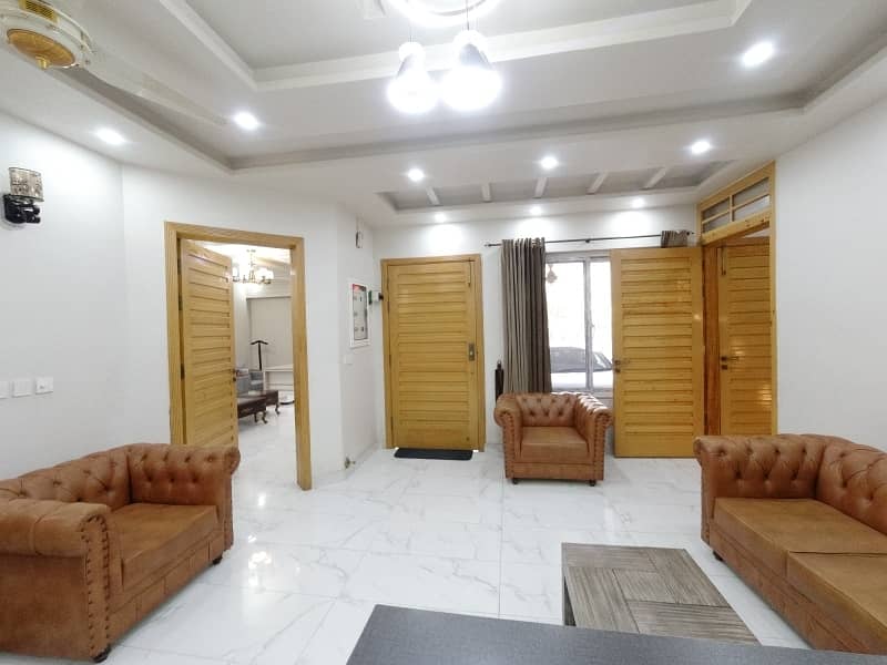 10 Marla Semi Furnished Brand New. Double Unit House Available. For Sale In Faisal Town F-18 On Main Double Road. In Block A Islamabad. 25