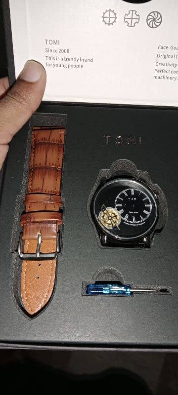 Tomi  watch man nd woman 4