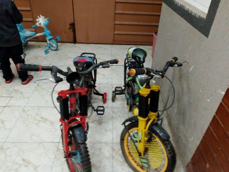 two used kids cycles 2