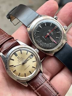 Two Omegas chronostop & seamaster chronometer.