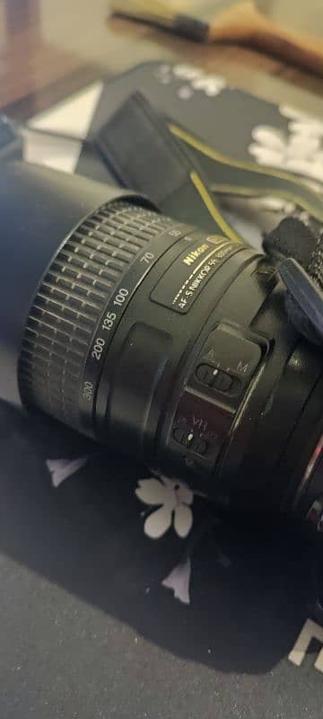 nikon D3300 dslr eith 70 300 lens auto 1