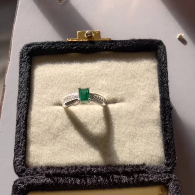 Emerald stone silver ring and locket 1