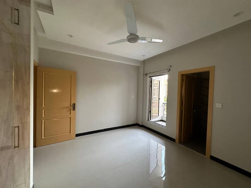 1 Bed Apartment Available For Sale. In Faisal Town Main Markaz. F-18 Block A. In Ghazyani Heights. 9