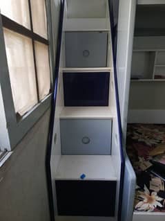 bunk bed with cupboard