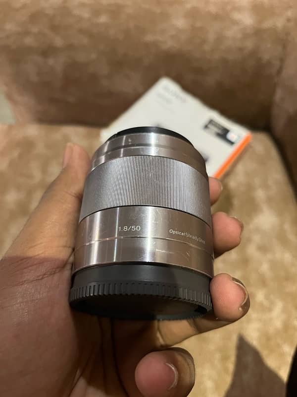 sony 6100 with 50mm 1.8 lens and box 1