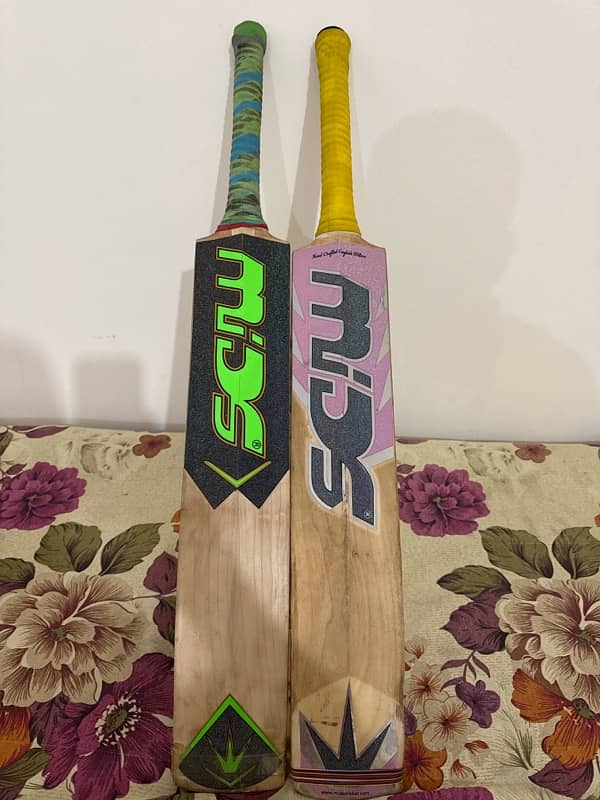 Two hard ball cricket bats 0