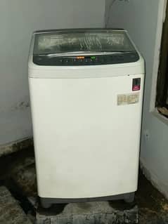 used lg 12 kg washing machine for sale urgently. condition is 9 by 10