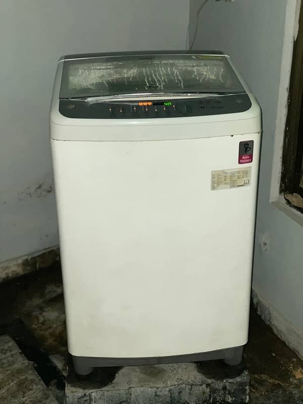 used lg 12 kg washing machine for sale urgently. condition is 9 by 10 0