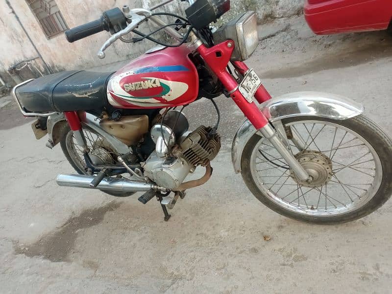 Suzuki 100cc 2 stroke japani Islamabad number antique bike e 14