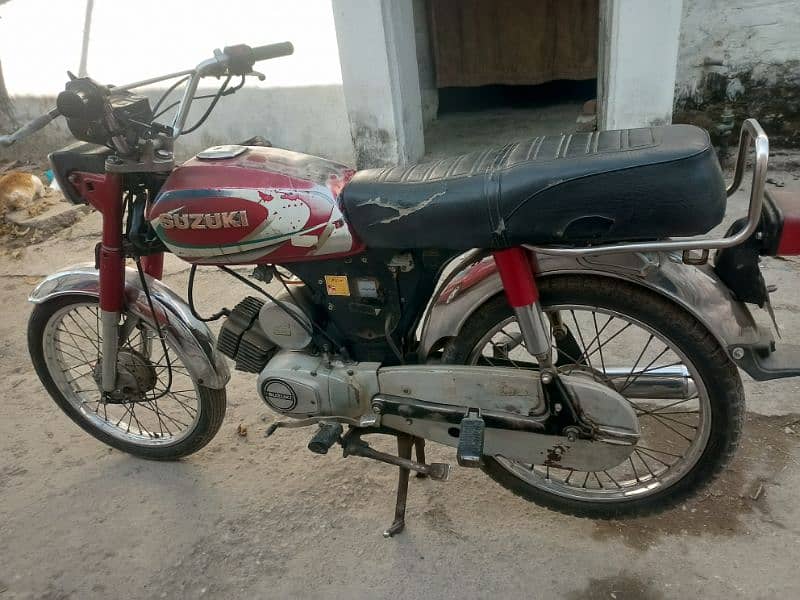 Suzuki 100cc 2 stroke japani Islamabad number antique bike e 18