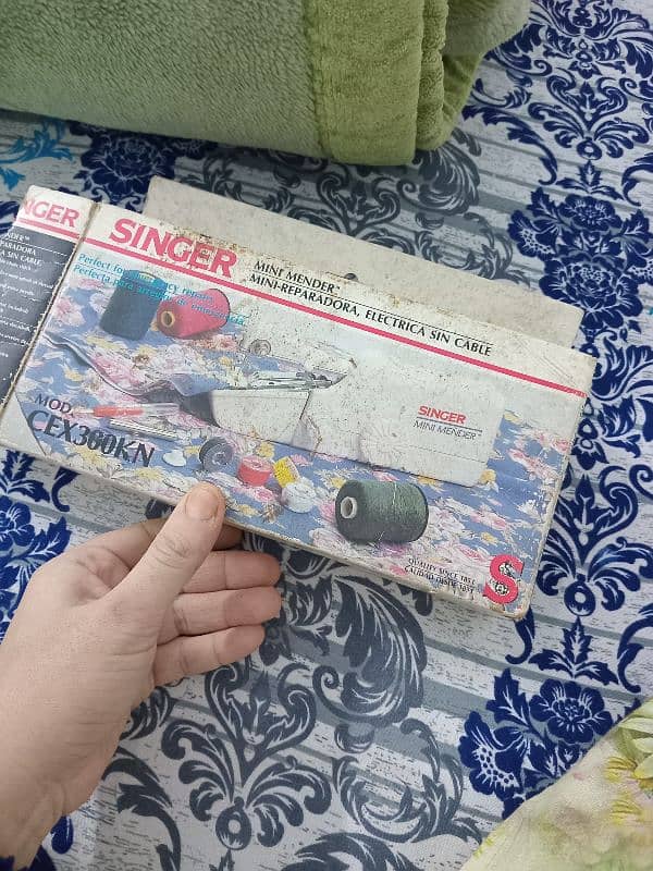 singer machine 3