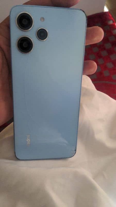 Xiaomi Redmi 12 blue Color 7/10 complete box Official PTA Approved 1