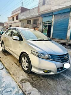 Honda City Silver 1300 CC.  13 Model