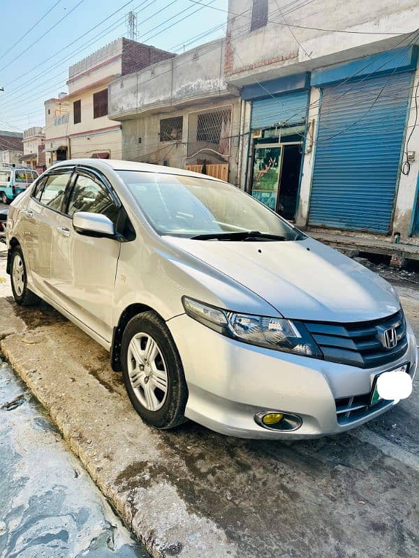 Honda City Silver 1300 CC.  13 Model 0