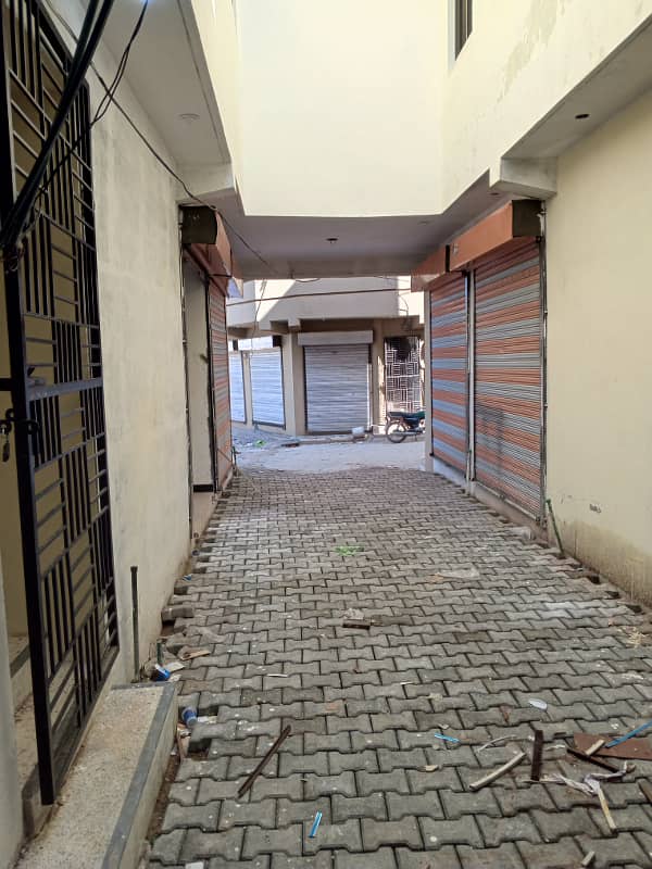 3 Marla Plaza Shop With Apartment Triple Story Electricity Water Rent Value 70000 Registry Intkal 23