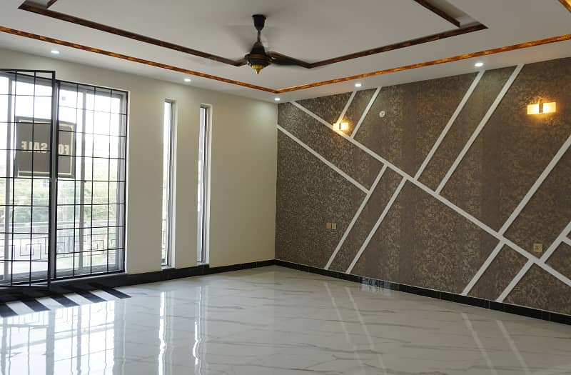 1 Kanal Designer House Ultra Modern 65 Feet Road Super Hot Location Solid Construction 40