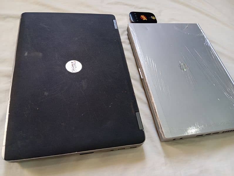 HP and Dell Laptop and Jazz Device 3