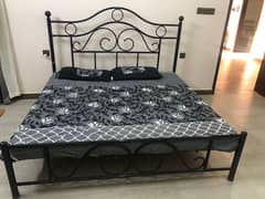 Iron rod bed with mattress