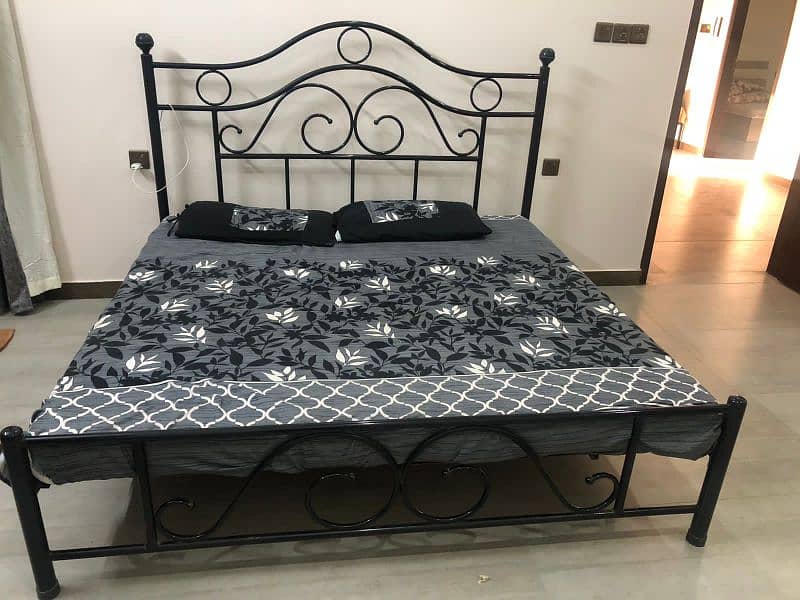 Iron rod bed with mattress 0