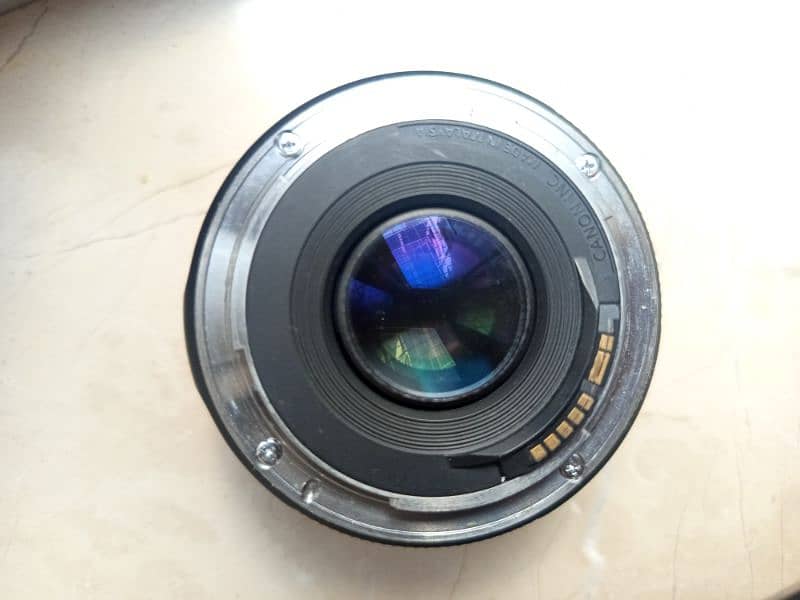 cannon 50  stm mm lence 1.8 new condition only 2 weeks use 3