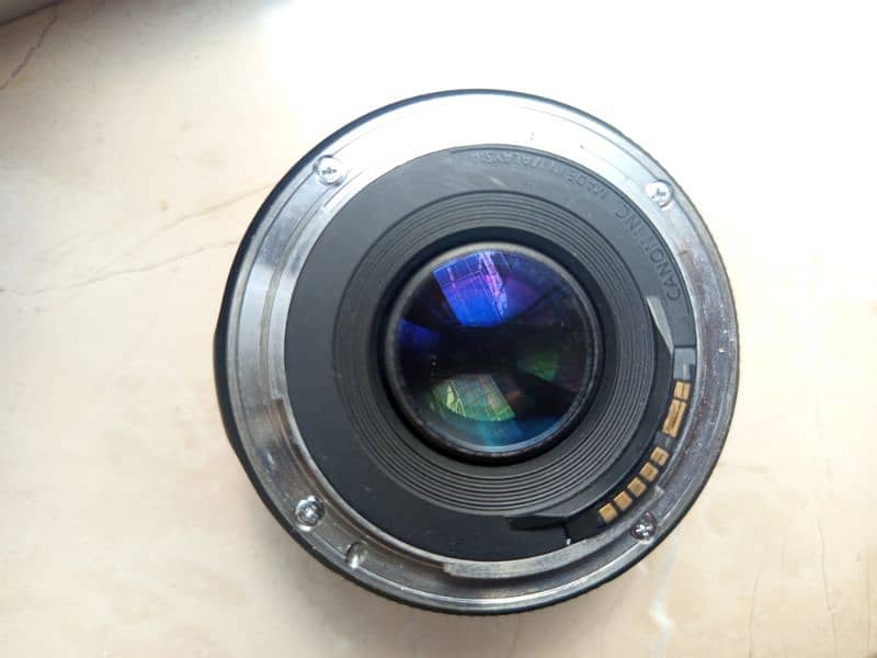 cannon 50  stm mm lence 1.8 new condition only 2 weeks use 4