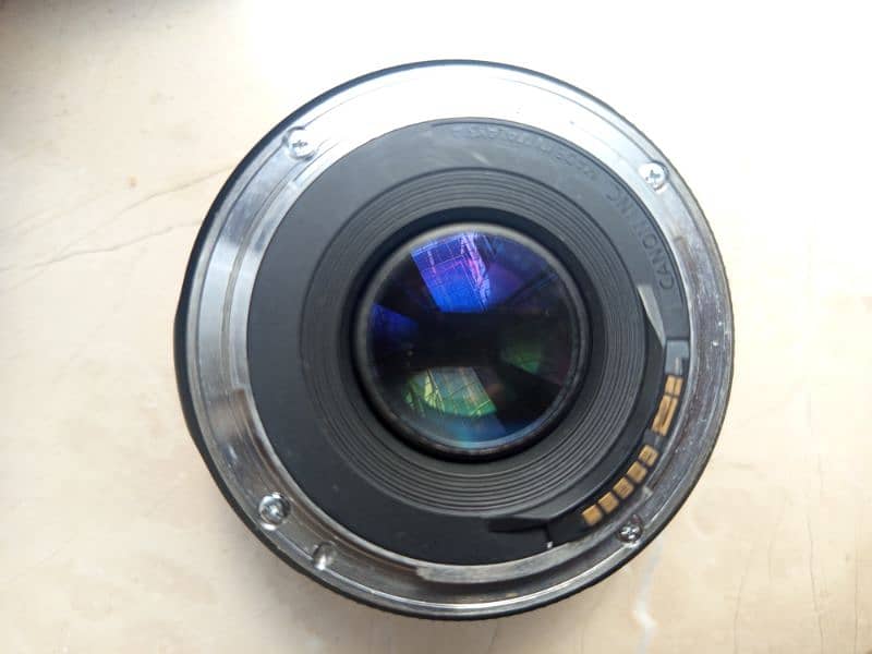 cannon 50  stm mm lence 1.8 new condition only 2 weeks use 6