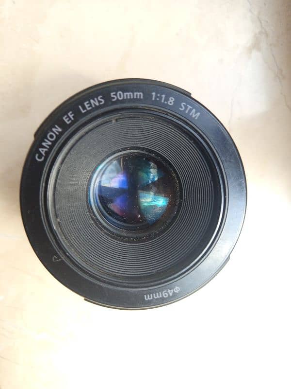 cannon 50  stm mm lence 1.8 new condition only 2 weeks use 10