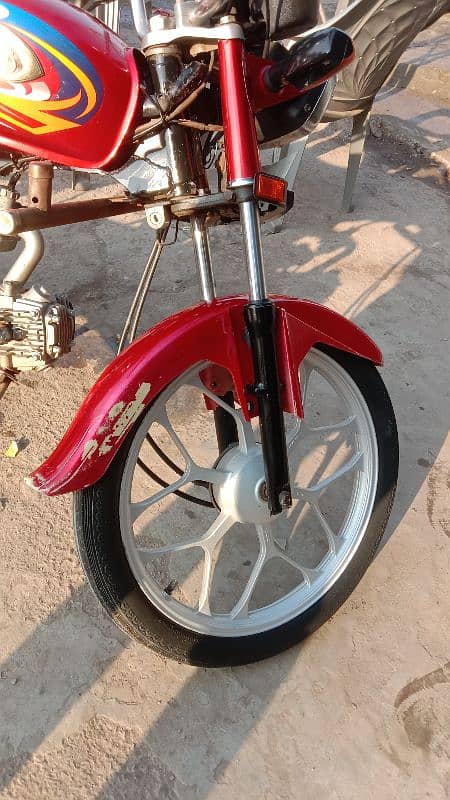 United 100 cc self start alloy wheels 2